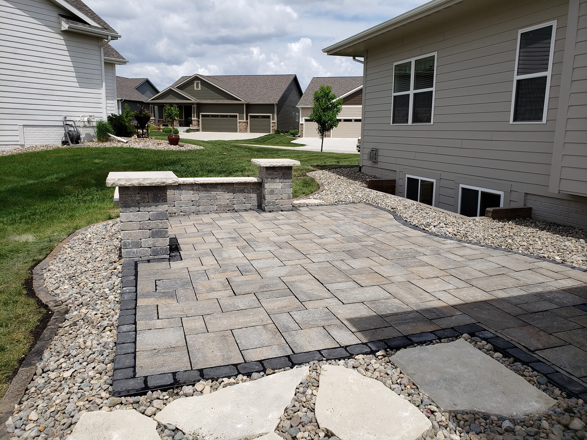 Patio with Retaining Wall Norwalk Seasonal Services